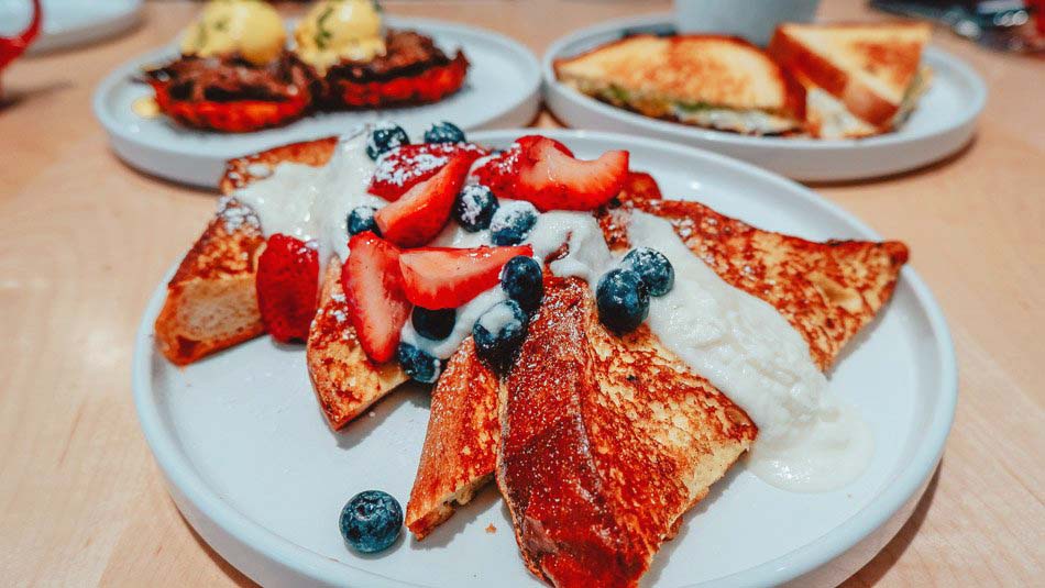Brioche French toast topped with lemon ricotta, strawberries and blueberries from The Morning Fork in Louisville, Kentucky.