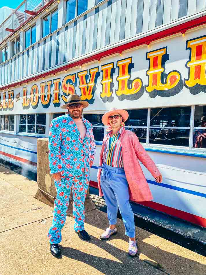 Let's Go Louisville's editor-in-chief Richie Goff and his husband dressed to the nines on Derby Week at the Belle of Louisville during the Great Steamboat Race!