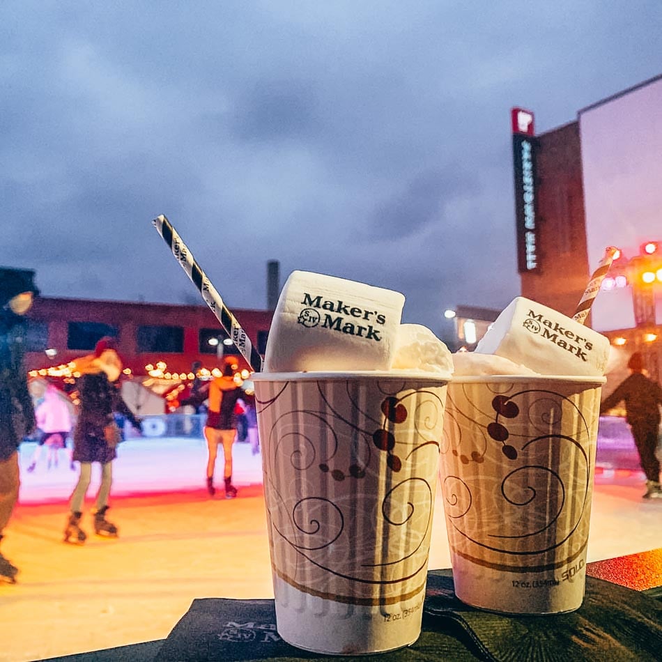 People skating with Maker's Mark Kentucky Hot Cocoa at Fete de Notel Paristown Louisville KY
