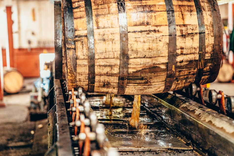 A picture of barrel dumping at Buffalo Trace Distillery intended for media kit usage.