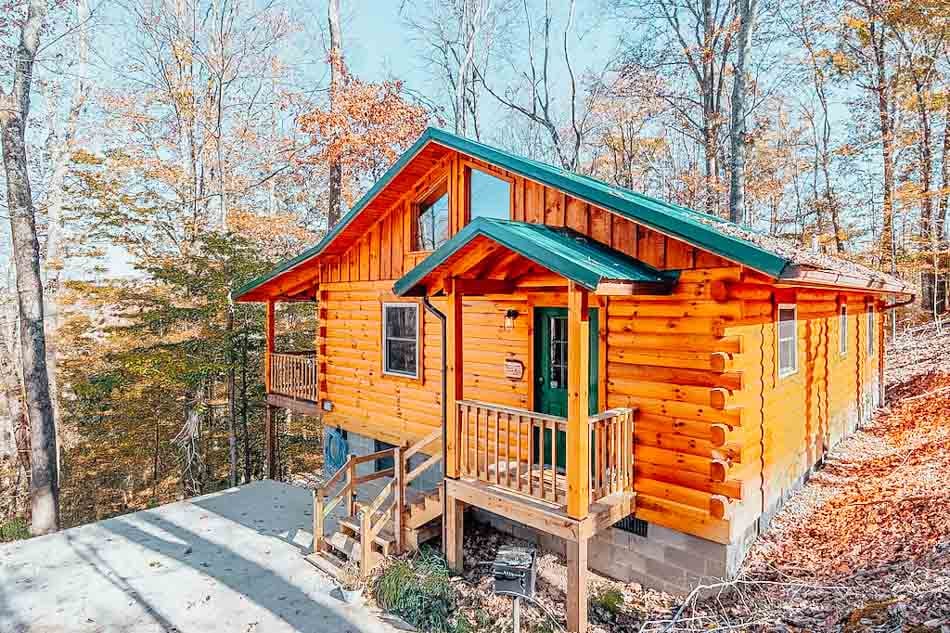 cozy canopy cabin with a hot tub in kentucky