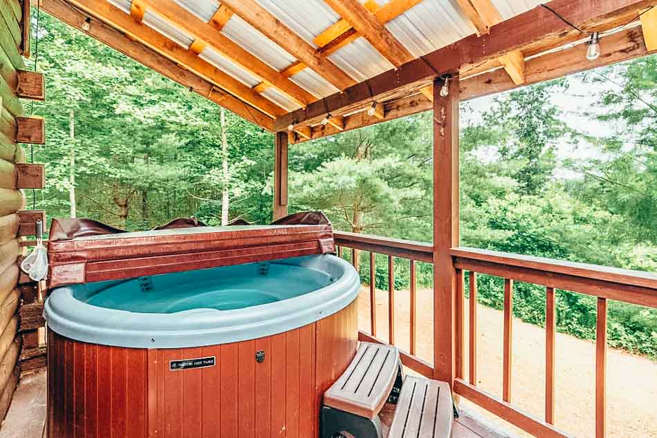 hot tub at secluded family stayover cabin kentucky